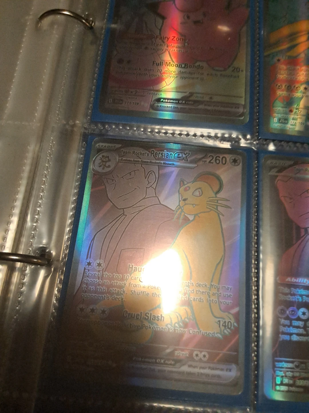 Team Rocket's Persian-EX Pokémon Card