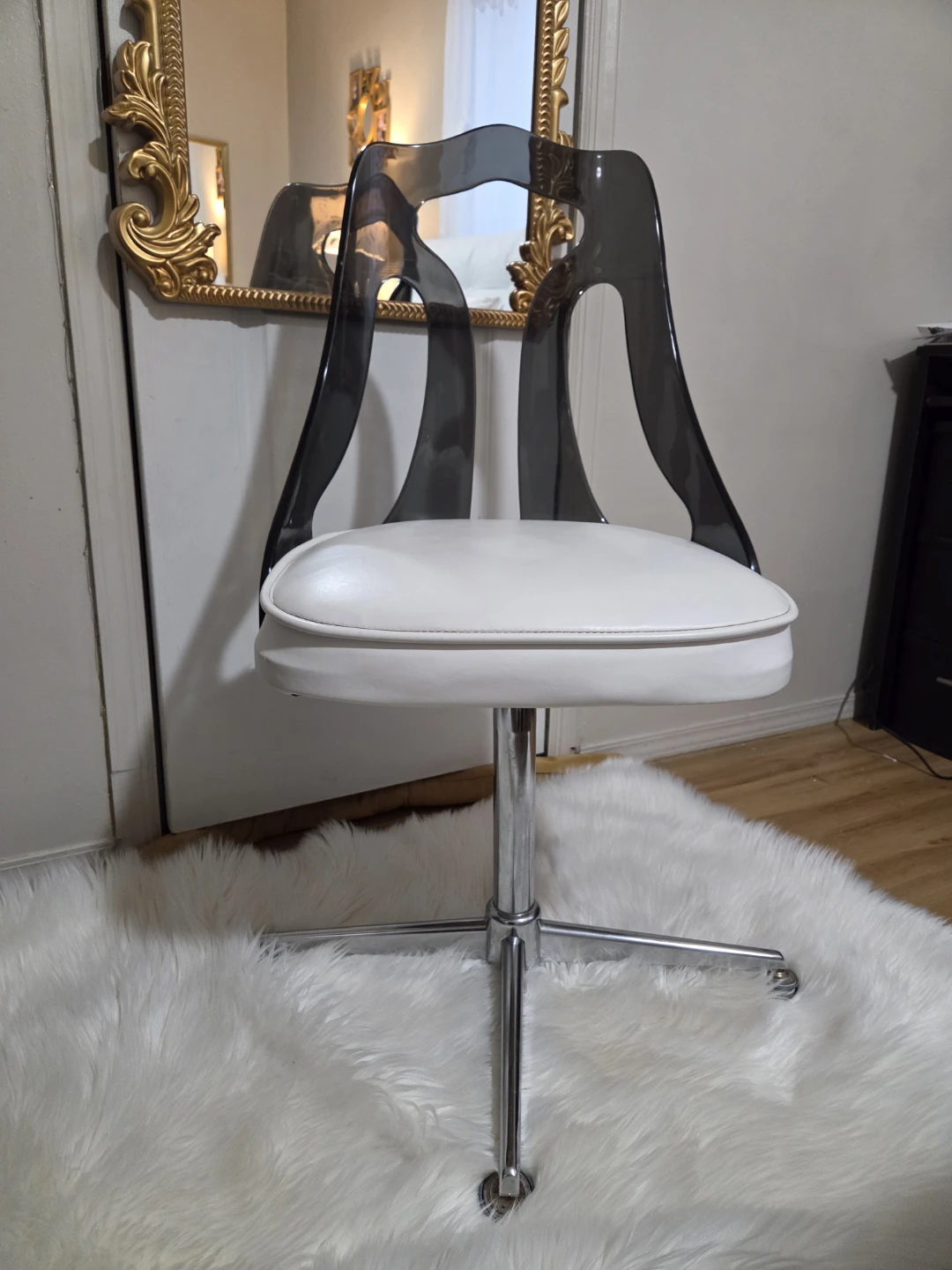 Sovereign smoked lucite swivel chair