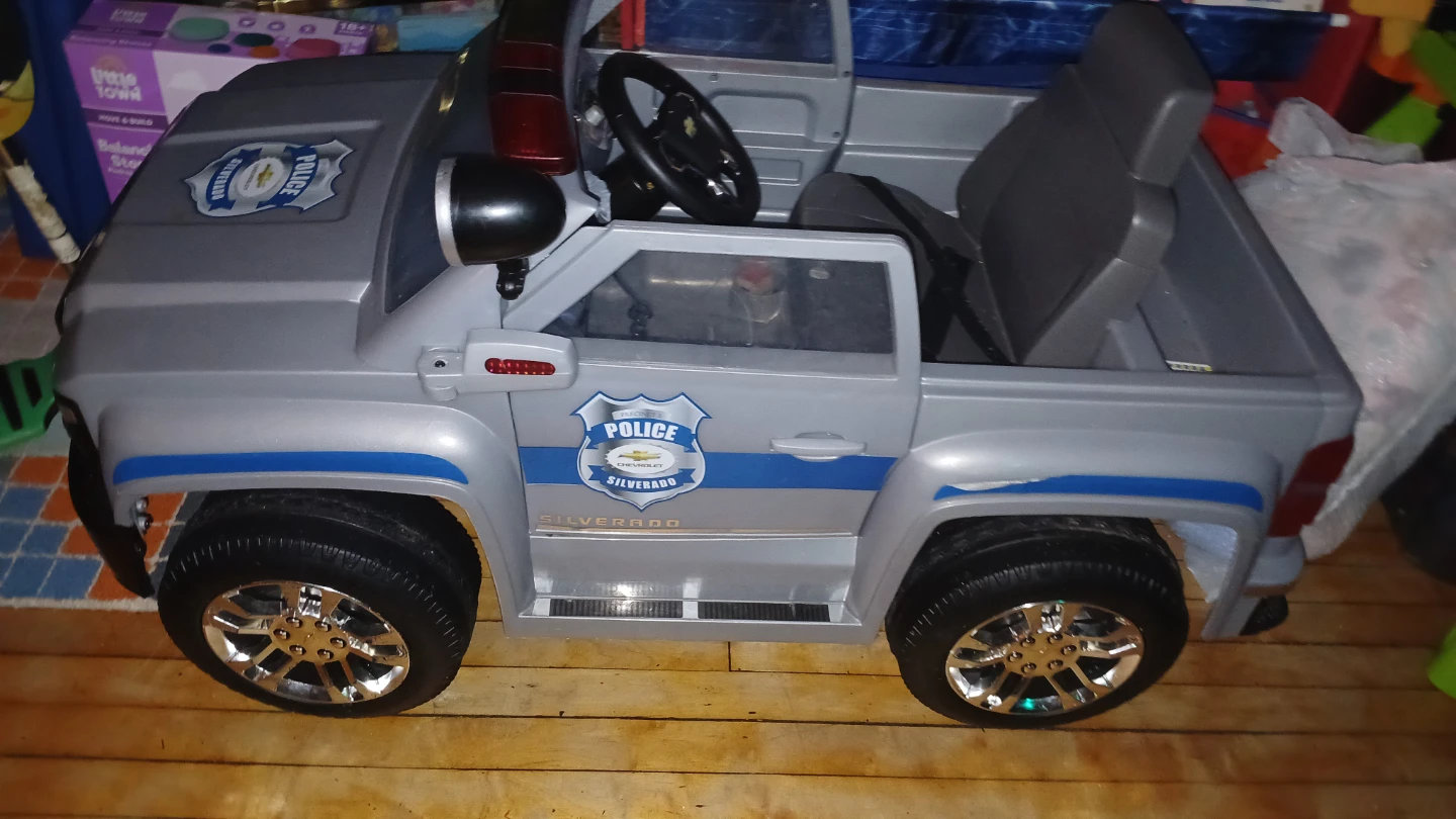 Police ride on car