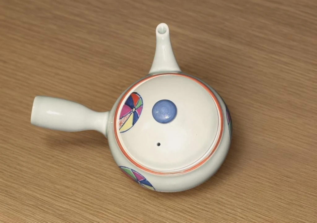 Antique Ceramic Teapot with Infuser