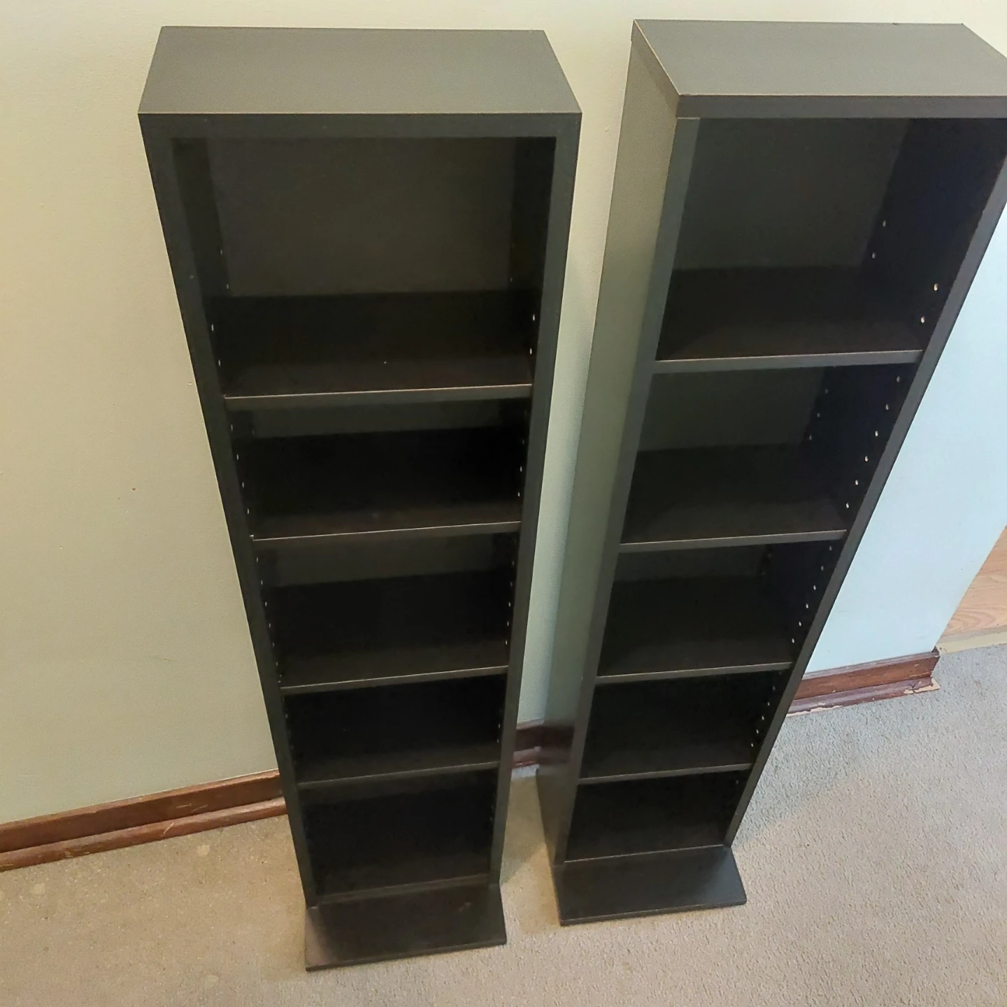 Set of two black shelving units