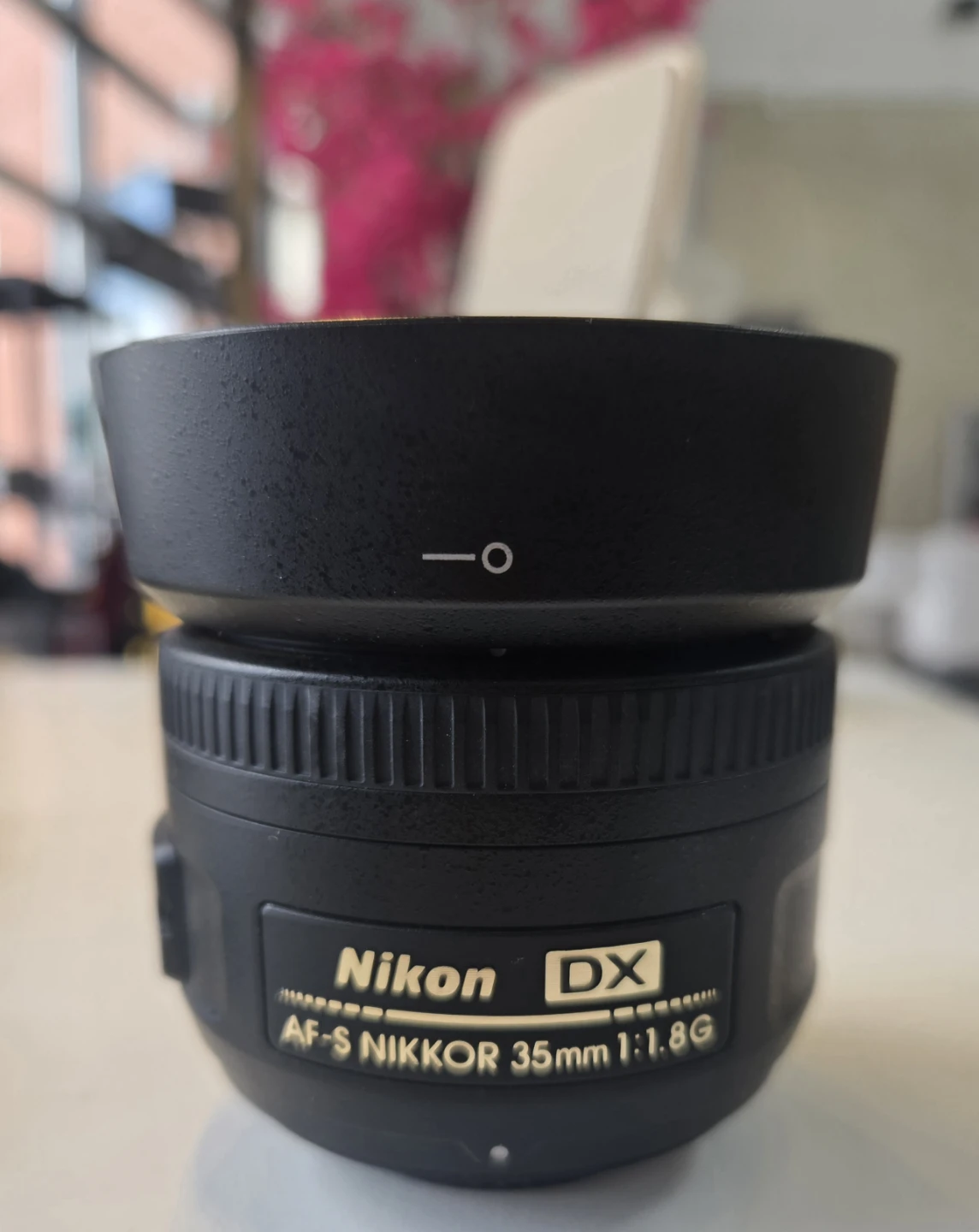 Nikon AF-S NIKKOR 35mm 1:1.8G Lens with HB-46 Hood