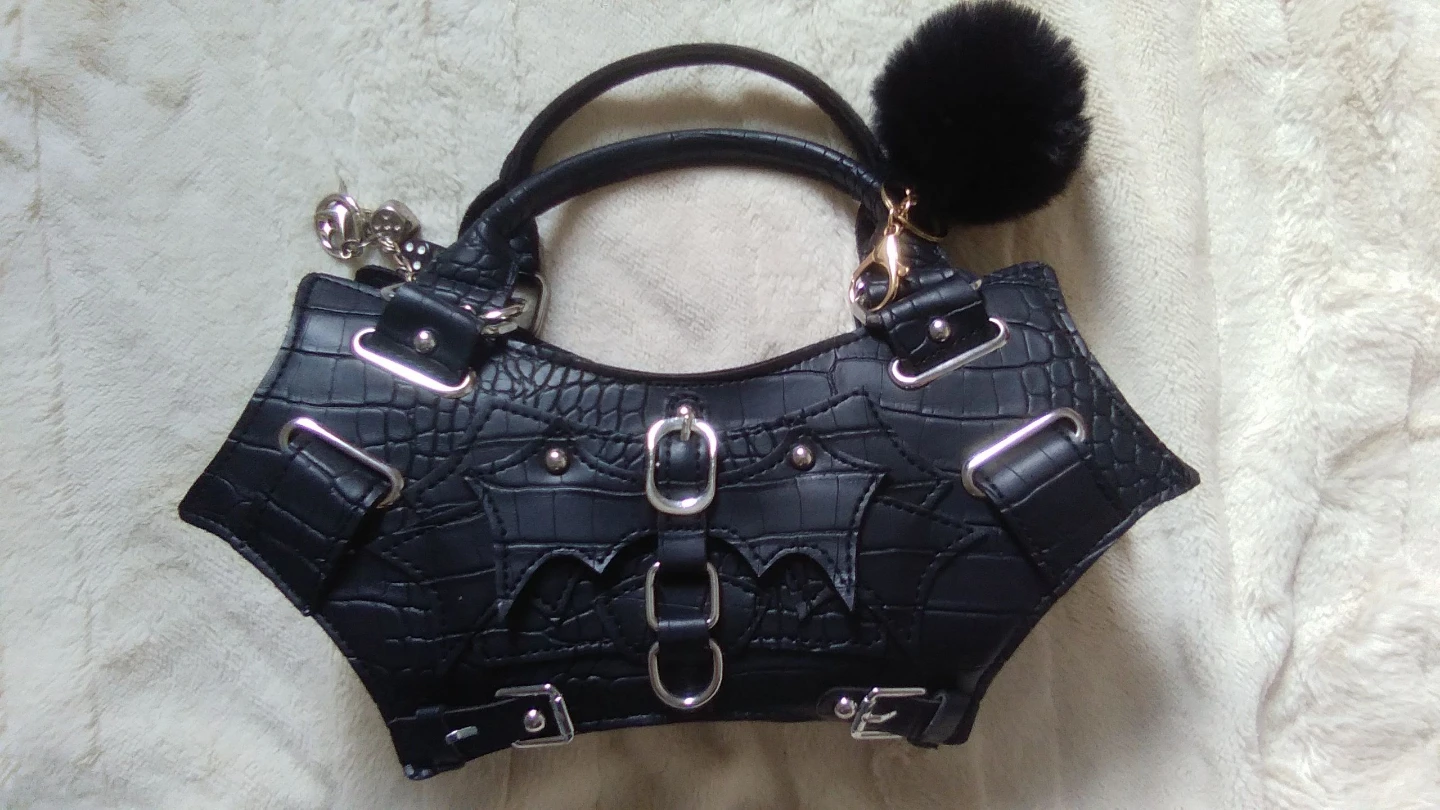 Black Bat Wing Handbag with Pom Pom Charm