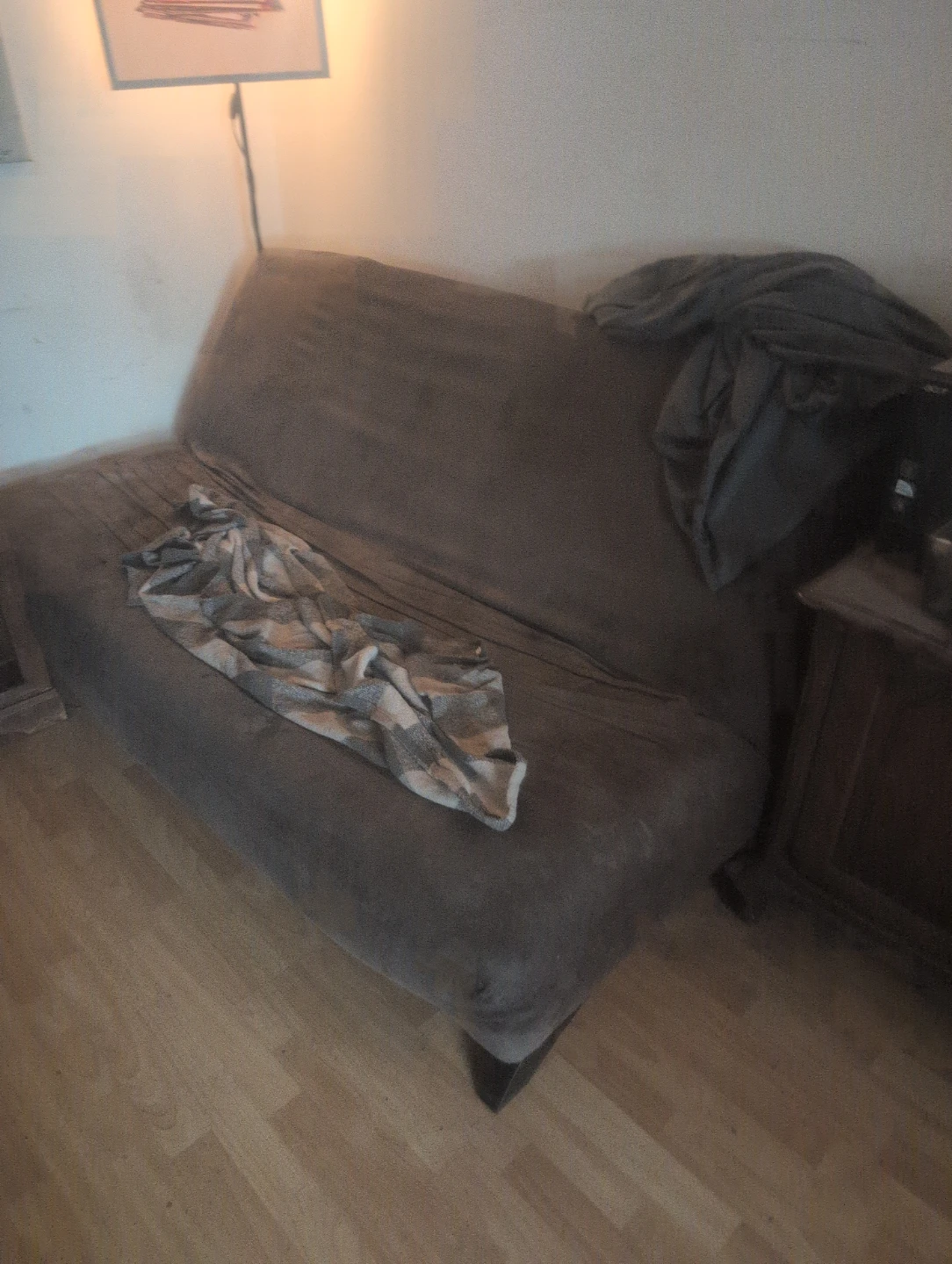 Brown Futon Sofa folds down for bed