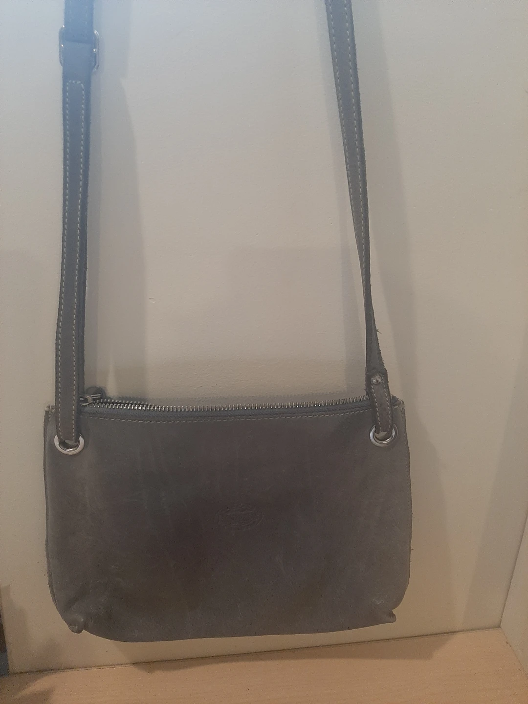 Roots leather purse