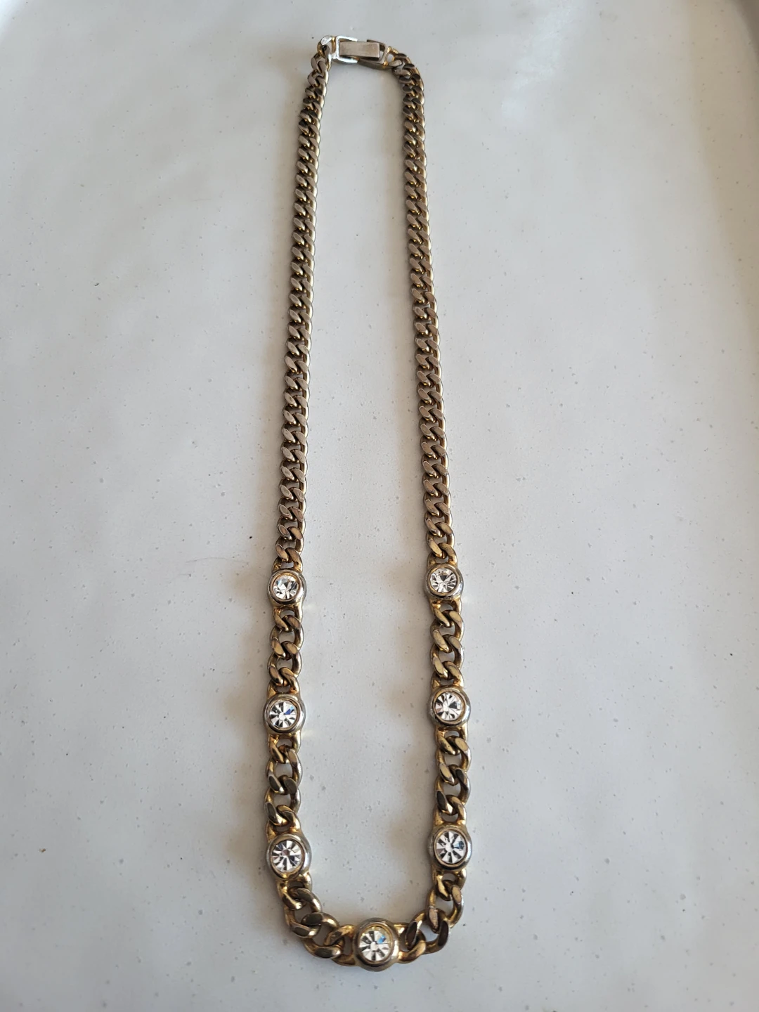 Gold-tone chain necklace with faux gems