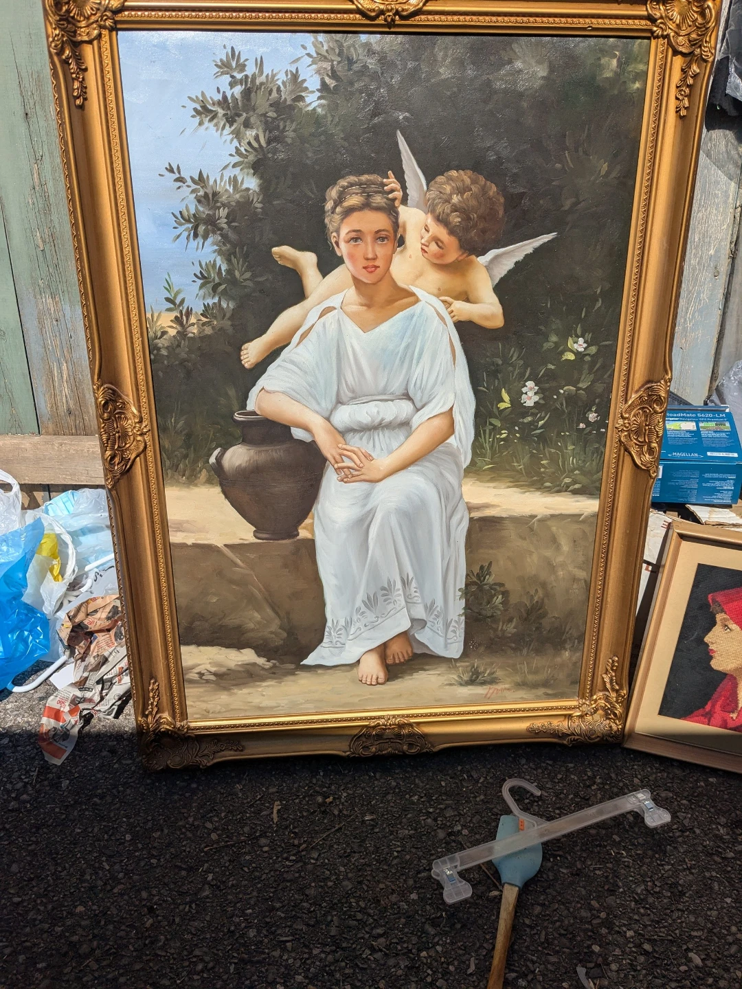 Framed Oil Painting of Woman and Cherub