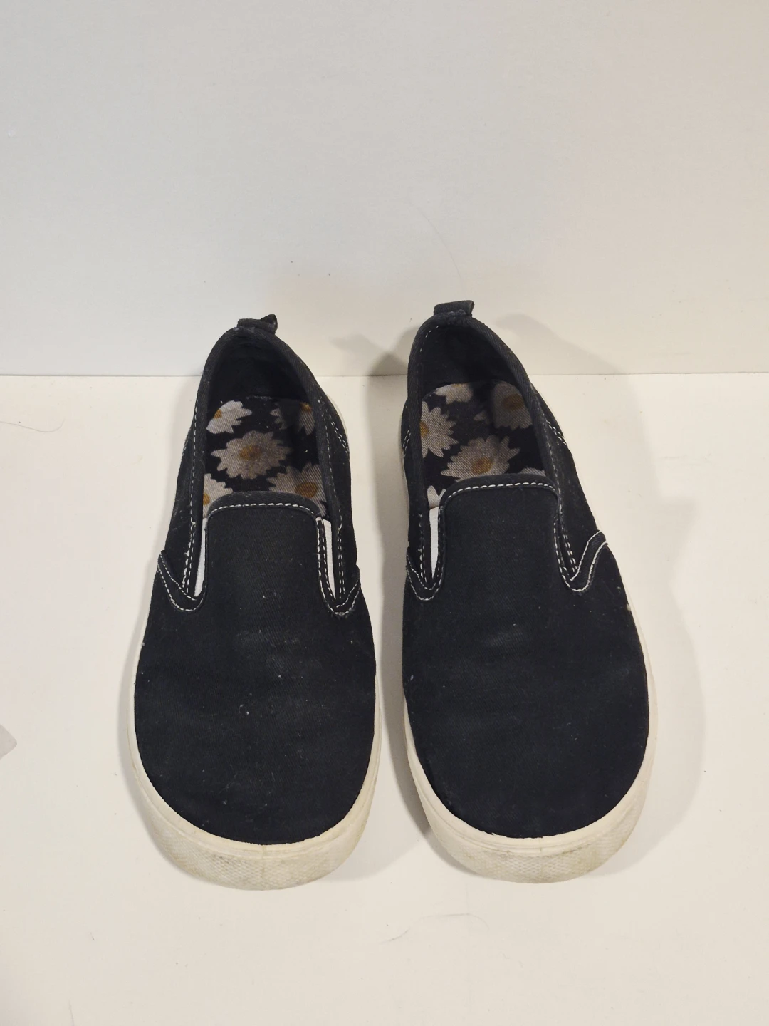 Black Slip-On Shoes with Daisy Print Insole
