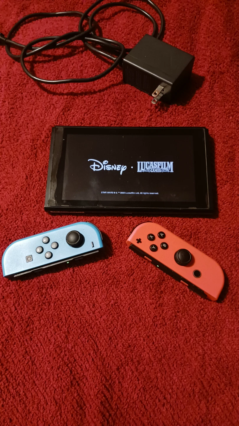 Nintendo Switch Console with Blue and Red Joy-Cons - photo 3