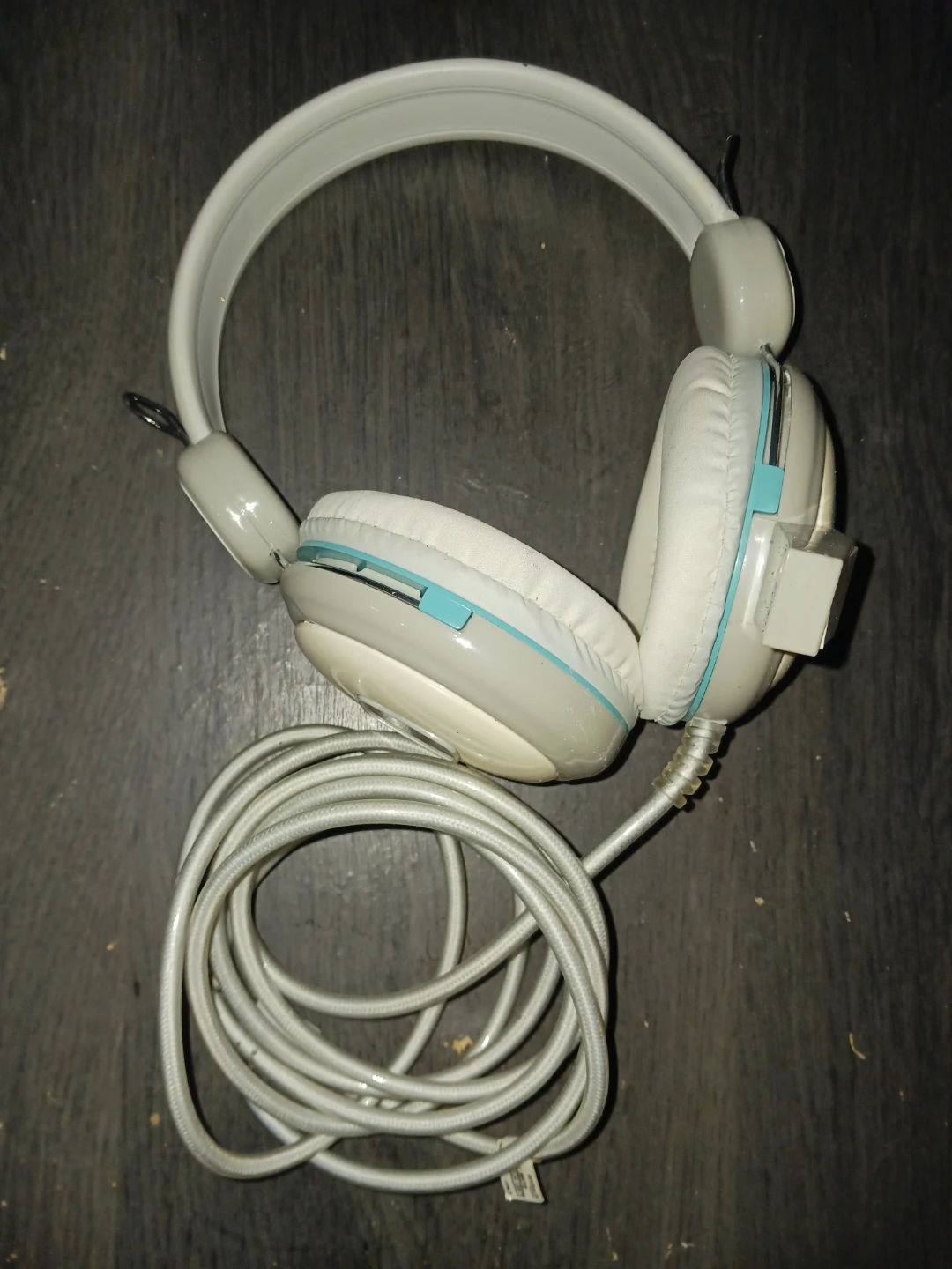 White On-Ear Headphones with Blue Accents.
