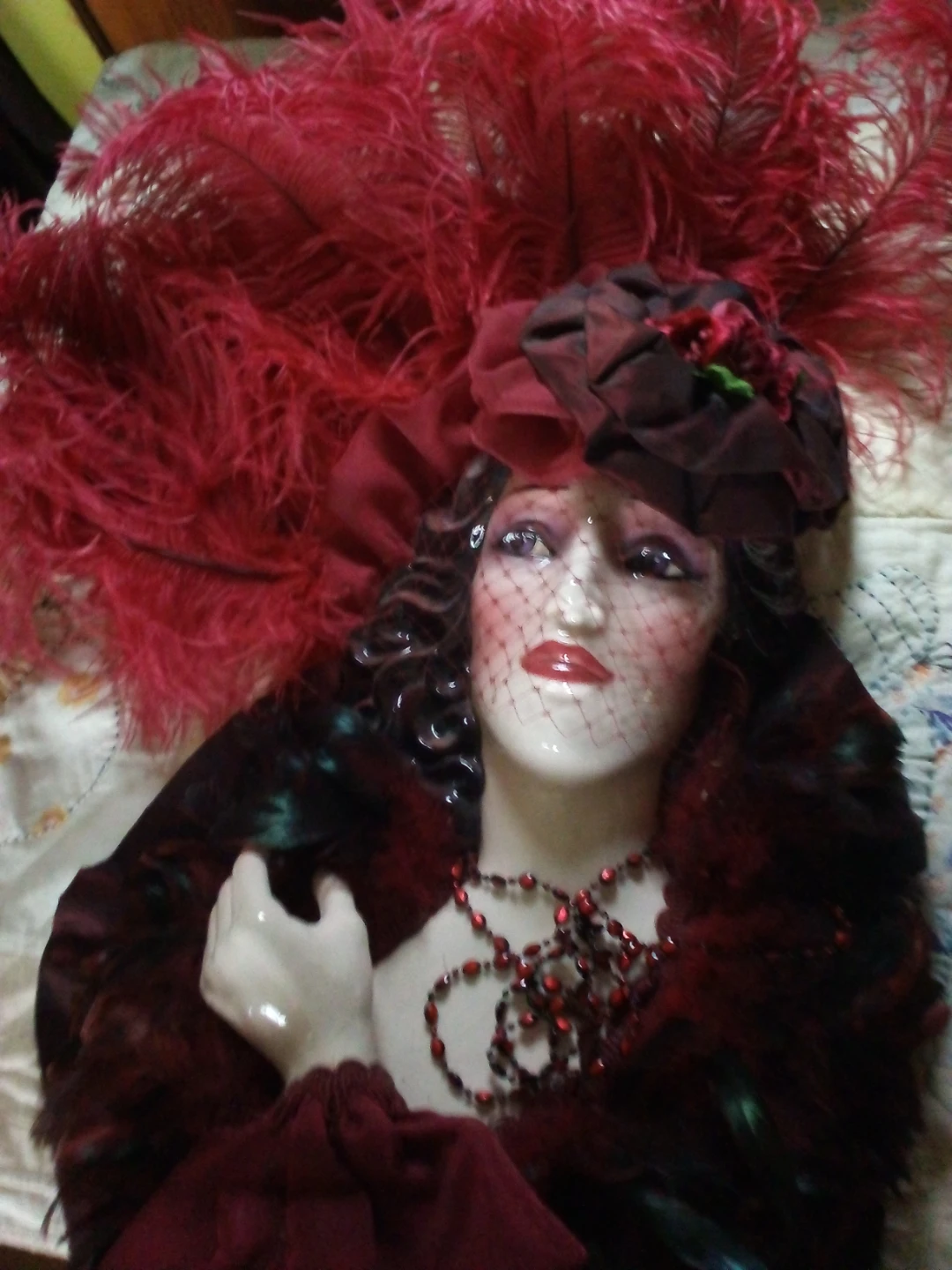 Decorative Lady Head Figurine with Red Feathers