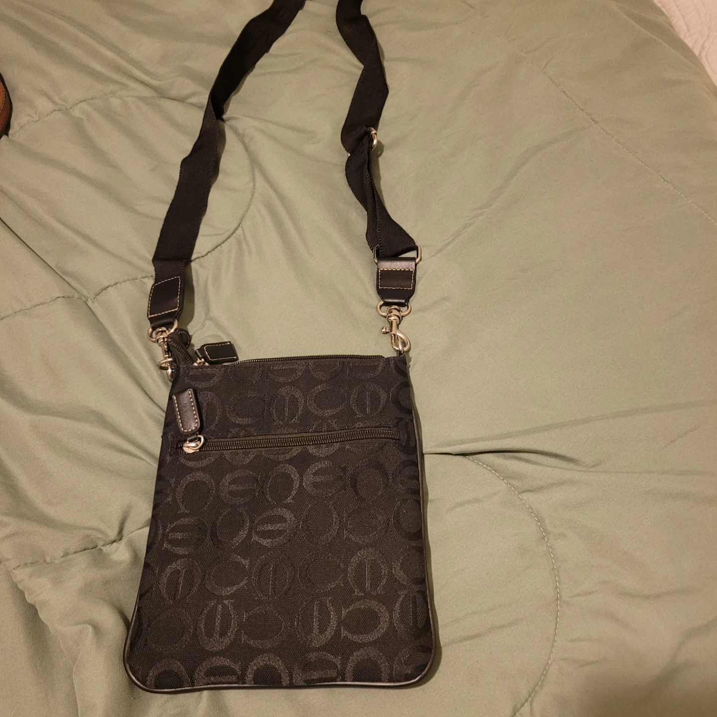 Black patterned crossbody bag