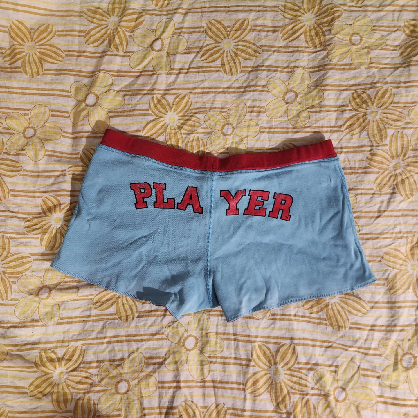 Blue and red "Player" reversible shorts