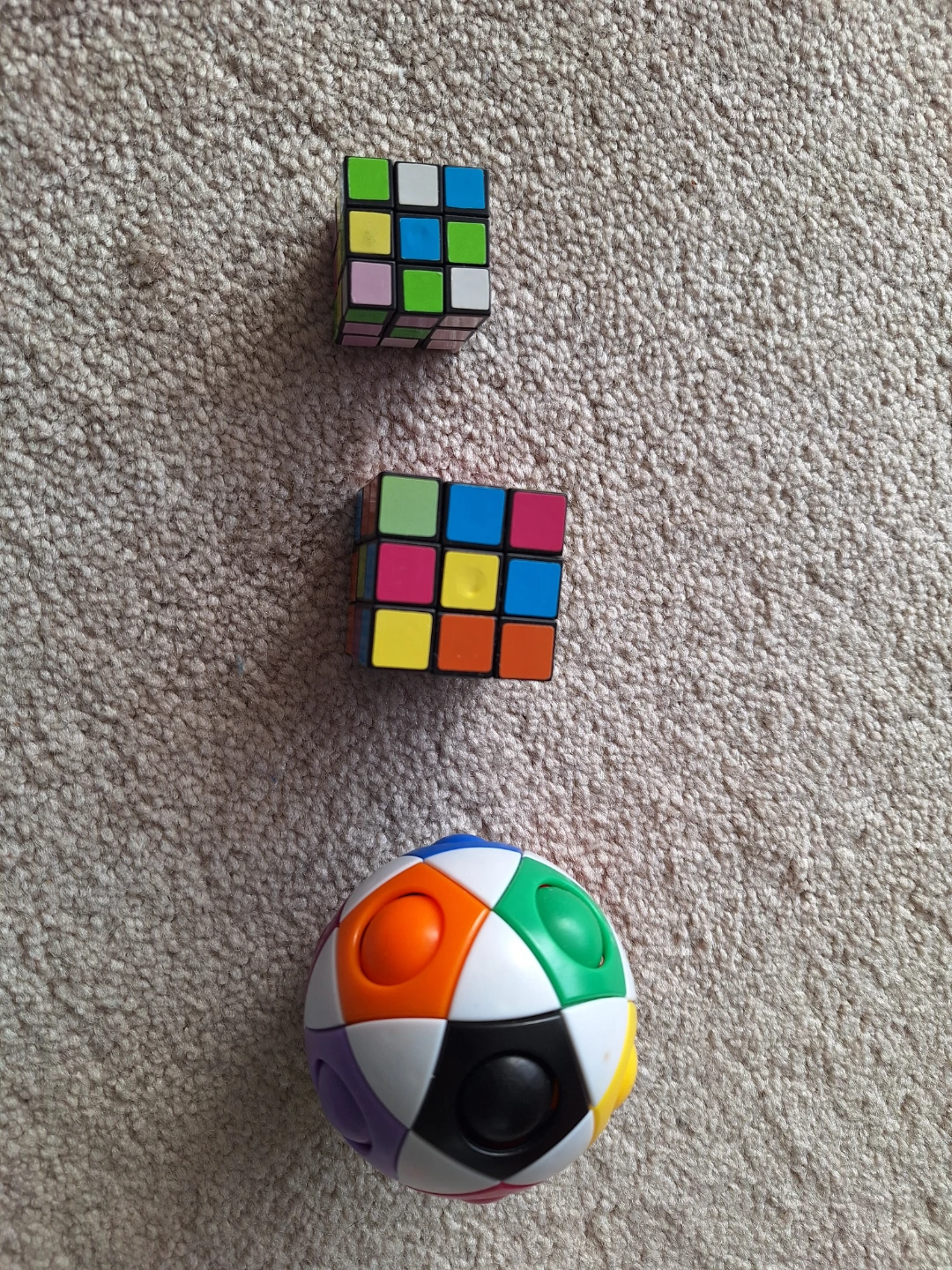 3 Rubics Puzzles - 2 Cubes and 1 Ball