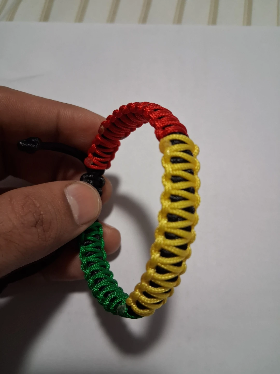 Rasta coloured braided bracelet
