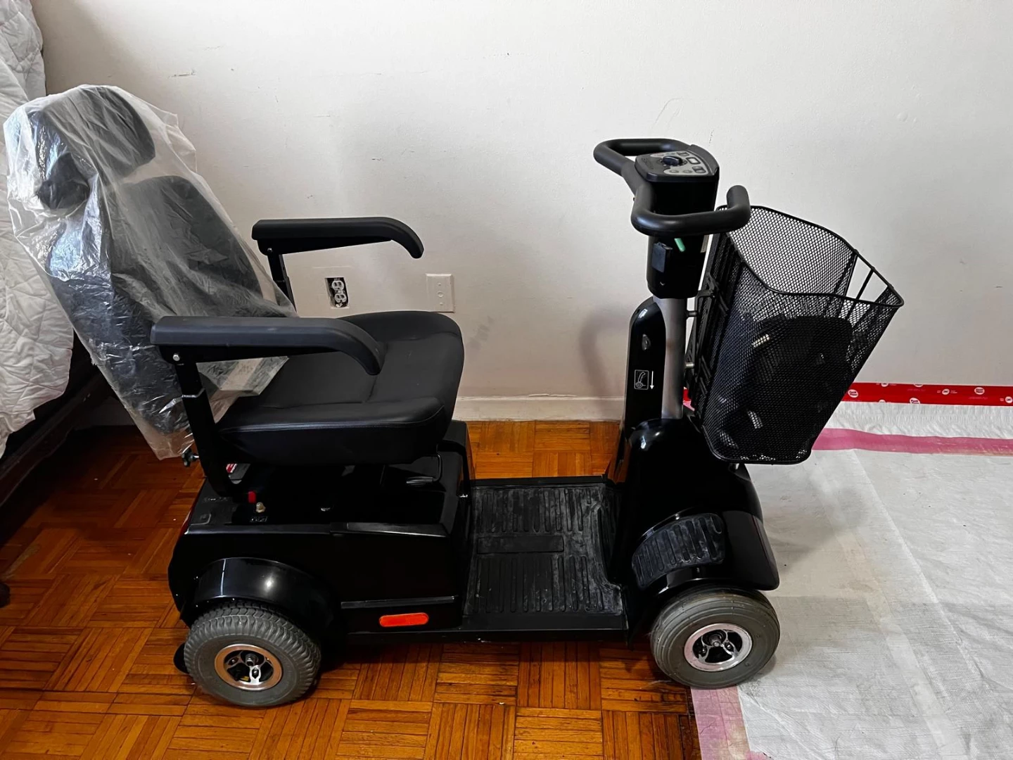 Black Mobility Scooter with Basket