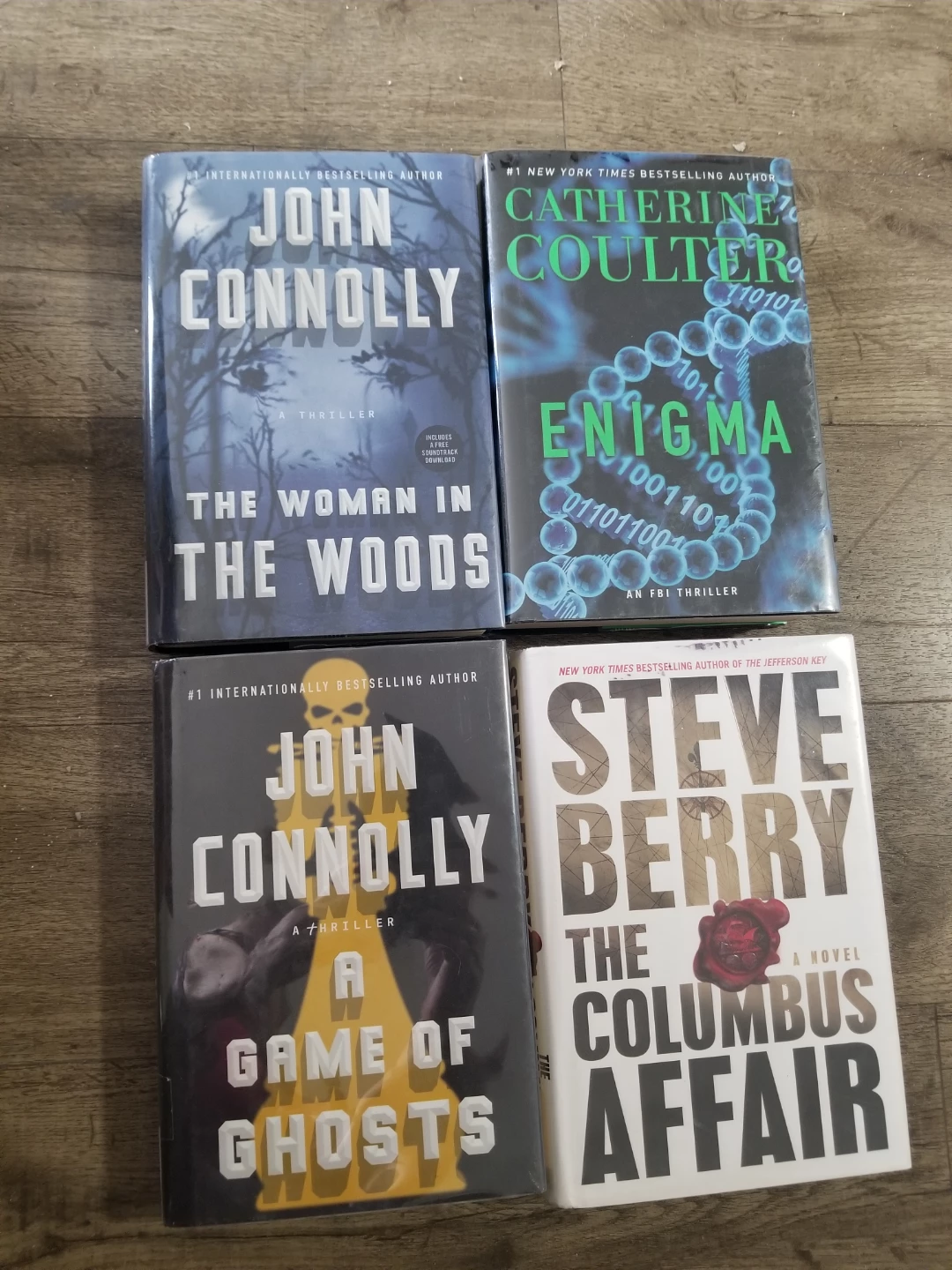 Four Previously Read Hardcovers $1 Each