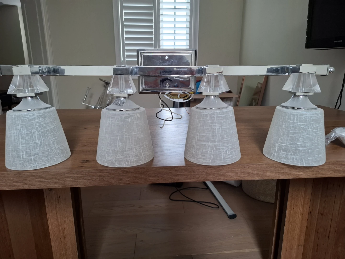 4-Light Vanity Fixture with Frosted Glass Shades