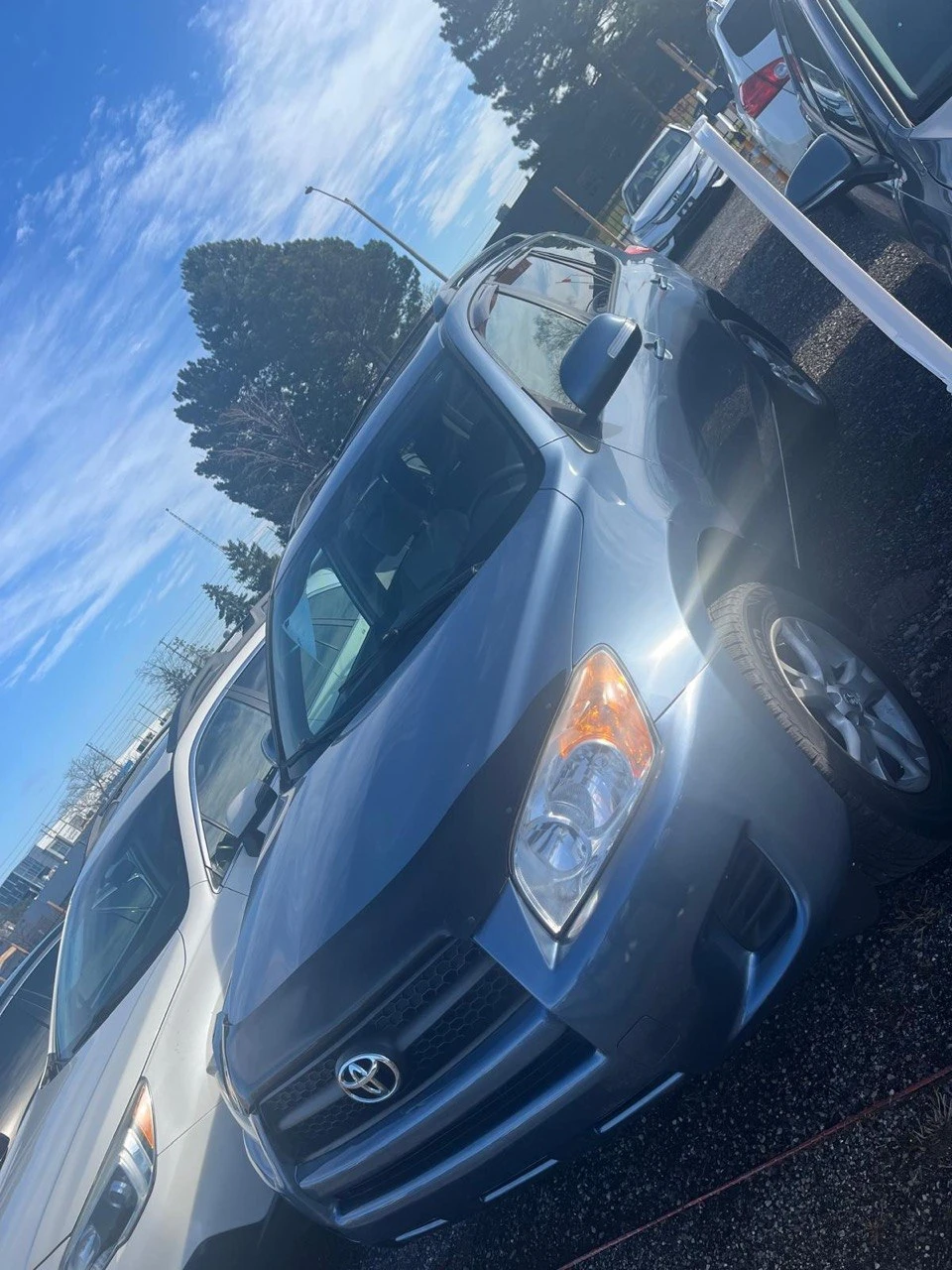 Blue Toyota RAV4 SUV - photo 3