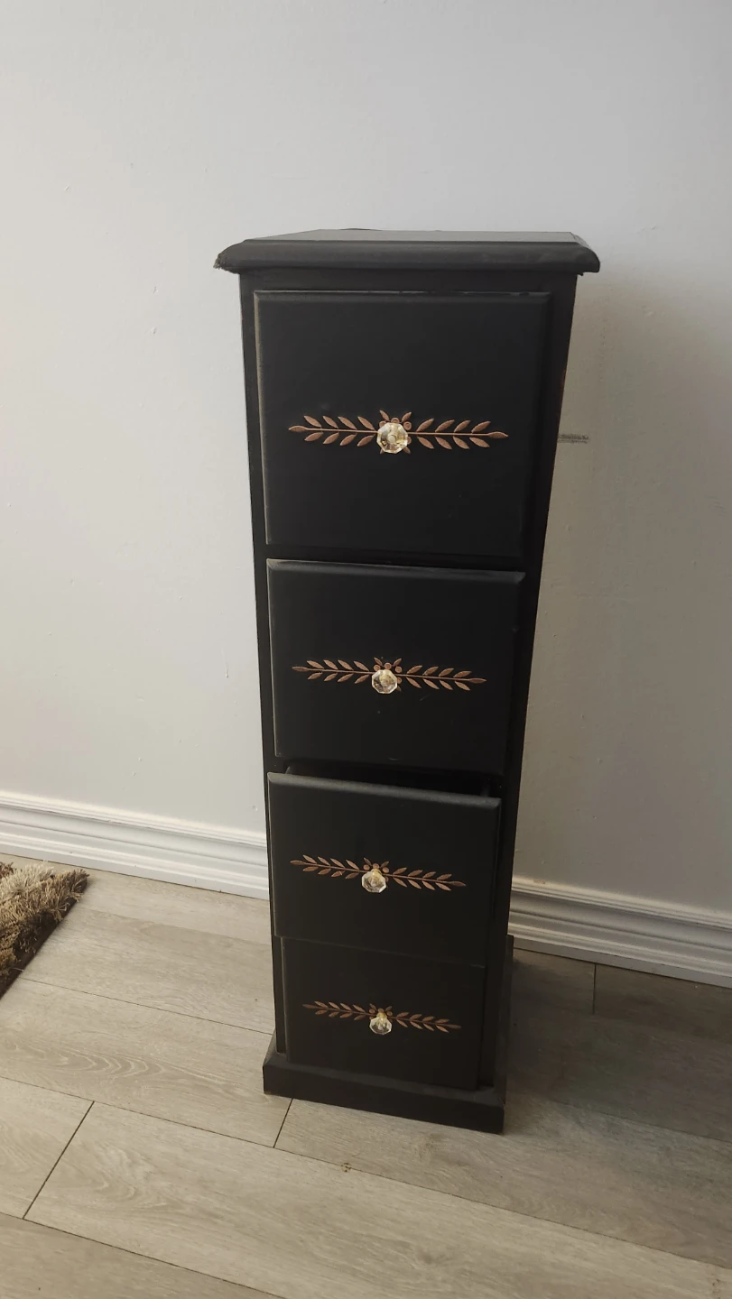 Black Tall Dresser with Decorative Knobs