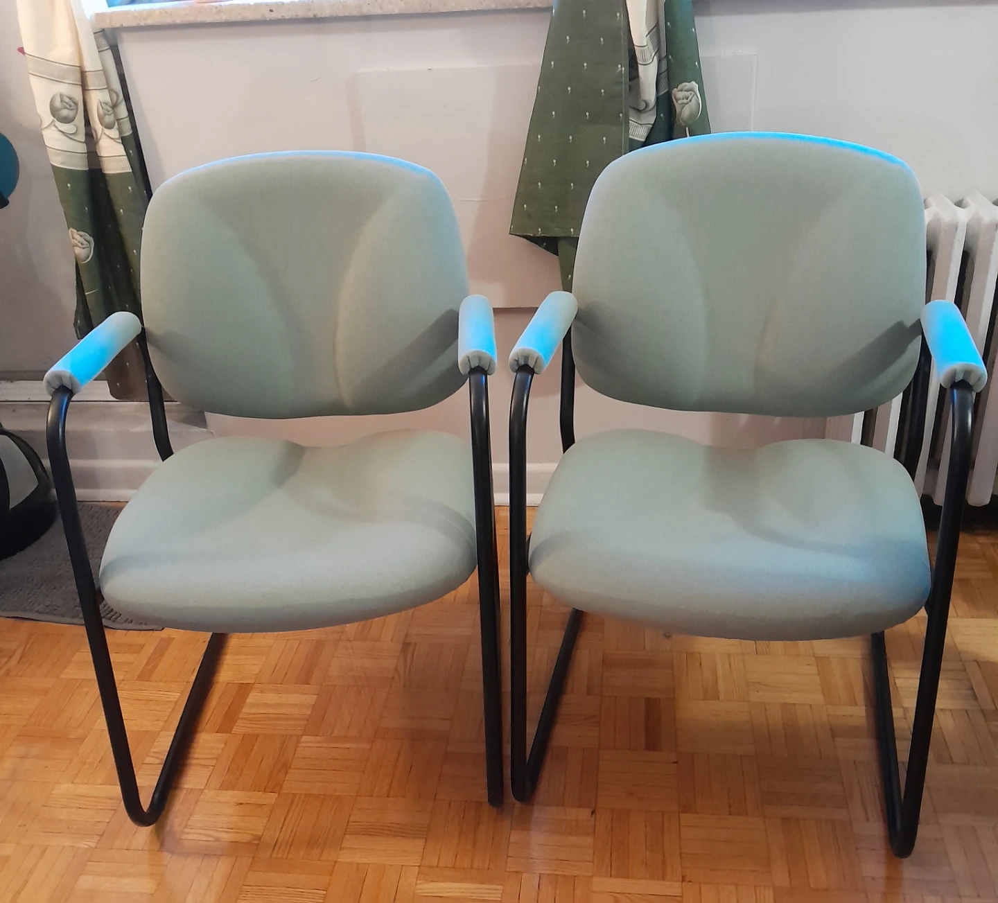 Two Light green office chair