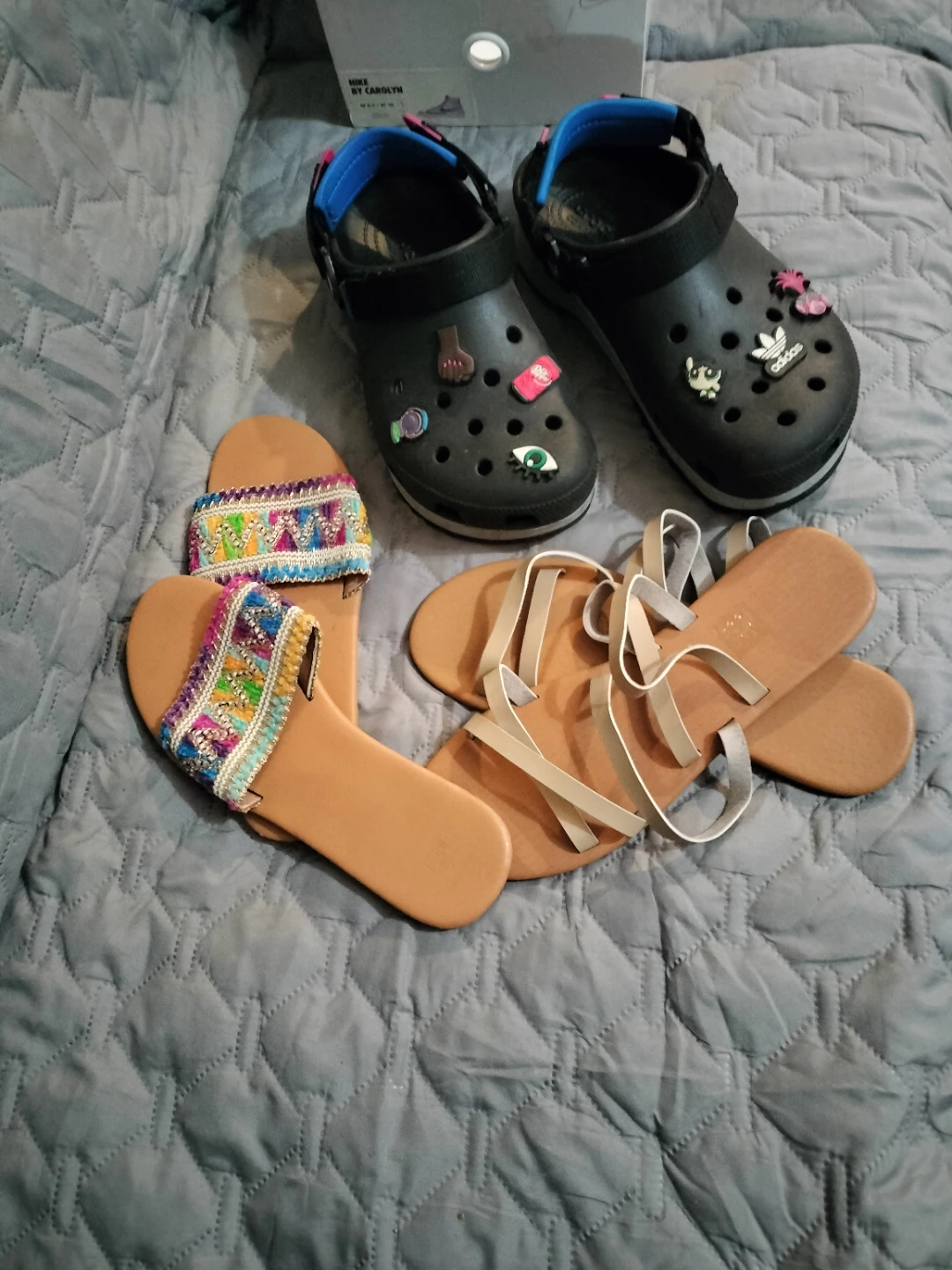 Black Crocs Clogs with design & 2 pair of tan sandals.