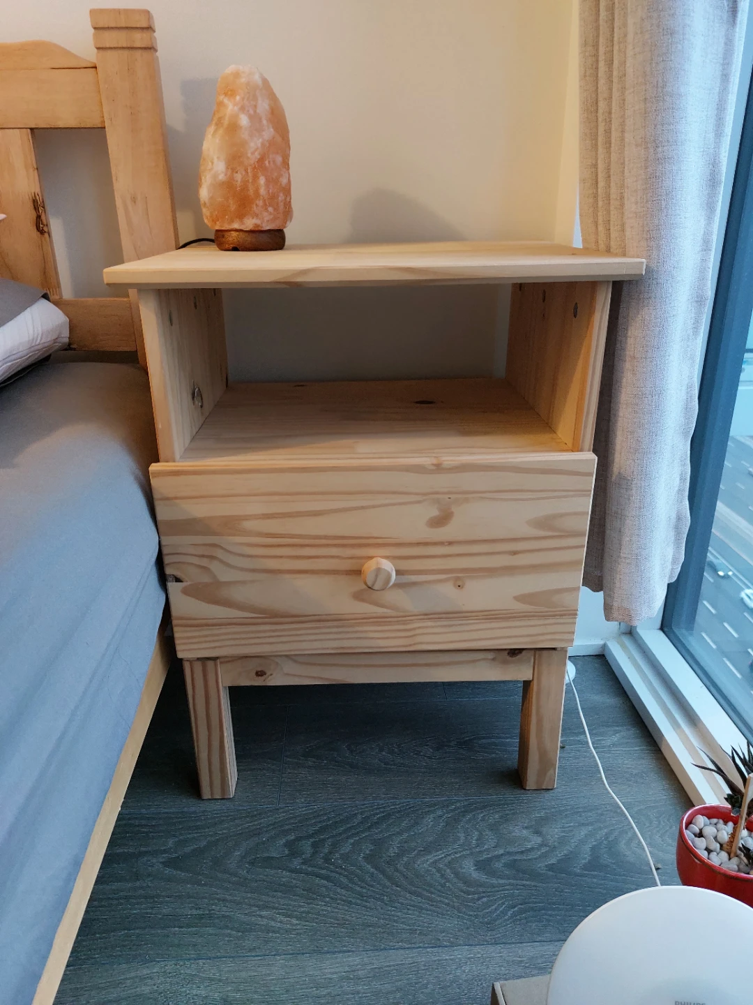 Natural wood bedside table