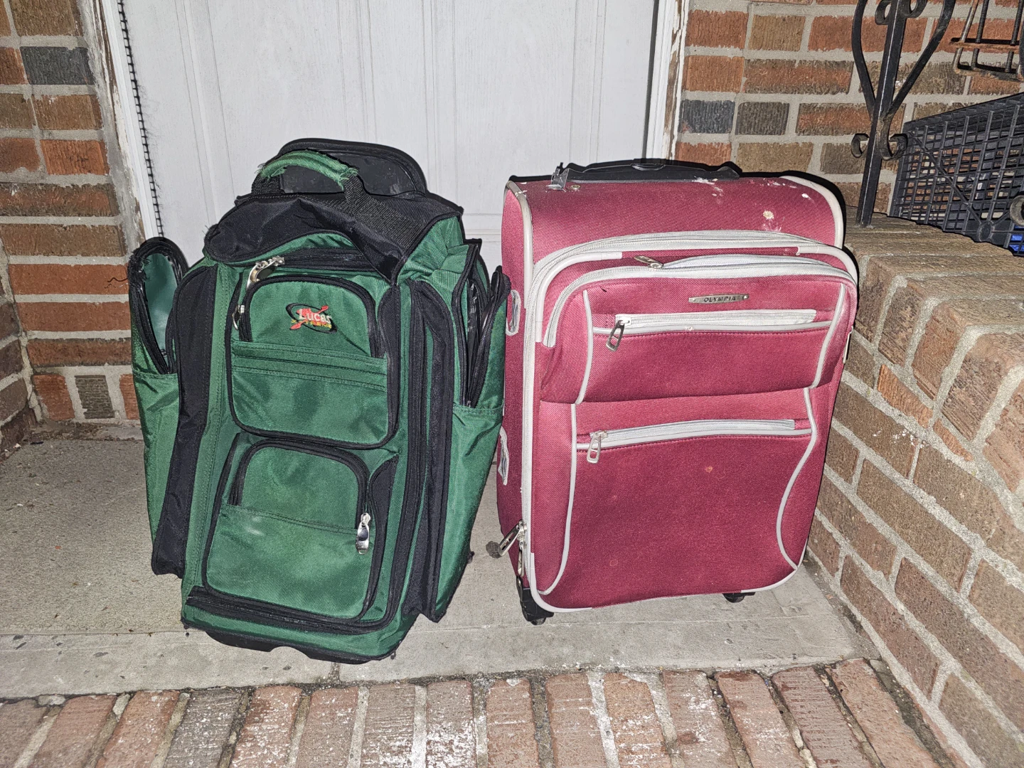 Green Travel Backpack & Red Rolling Suitcase