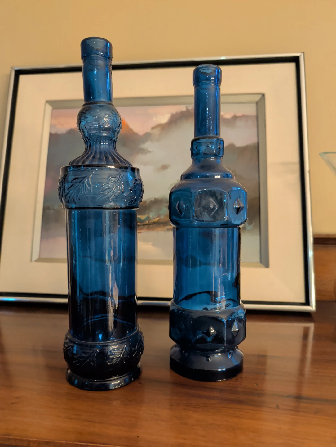 Two Blue Glass Decorative Bottles