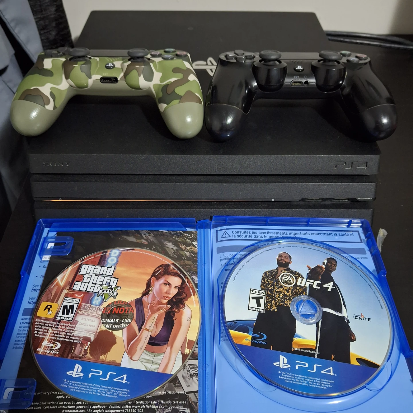 Sony PlayStation 4 Pro Console with 2 Controllers and Games