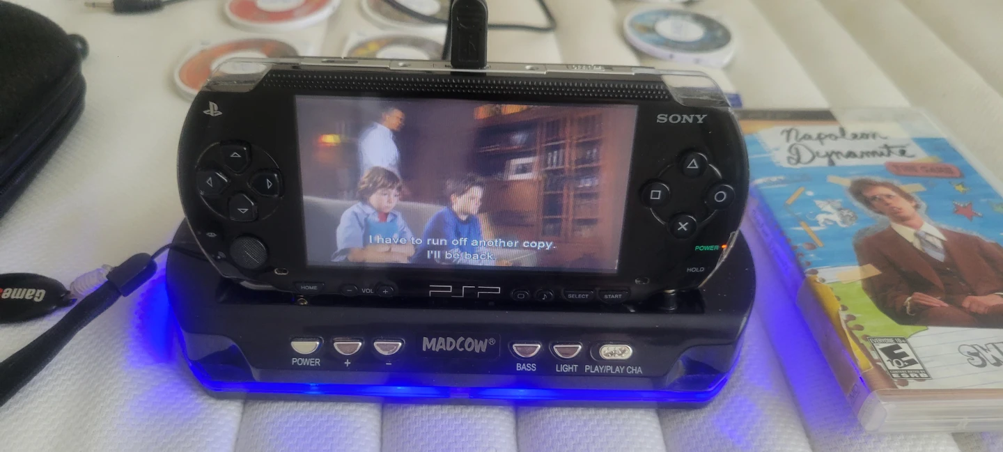 Sony PSP  with MadCatz Dock and Games