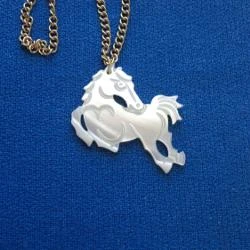 MOTHER OF PEARL CARVED HORSE PENDANT WITH GOLD TONE CHAIN