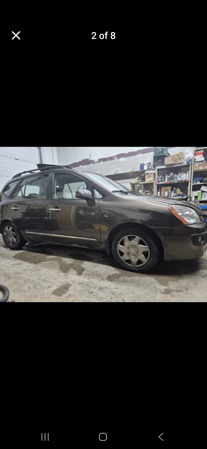 Kia Rondo 2009 - photo 2