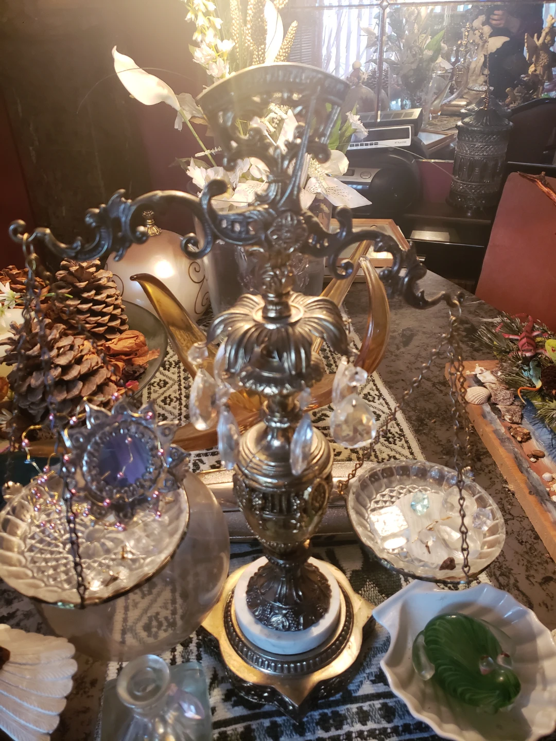 Vintage ornate metal candelabra with crystals