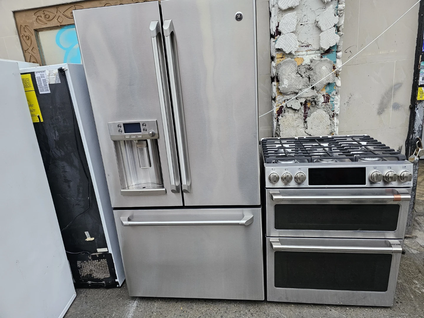 GE Cafe Refrigerator and gas stove set