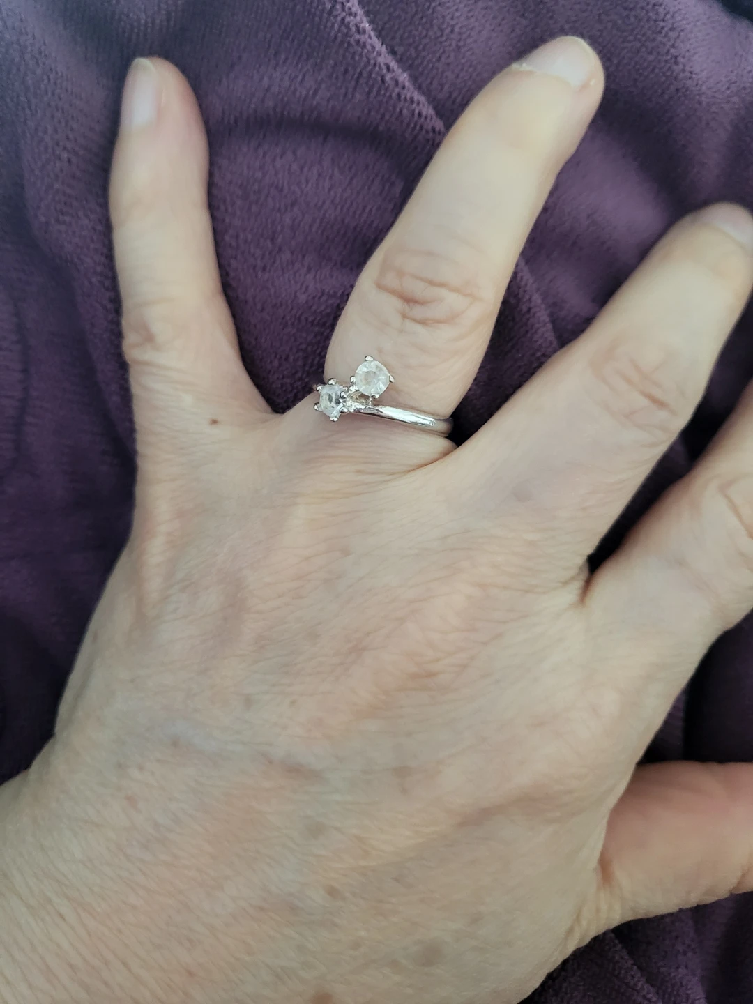 Silver ring with two clear stones