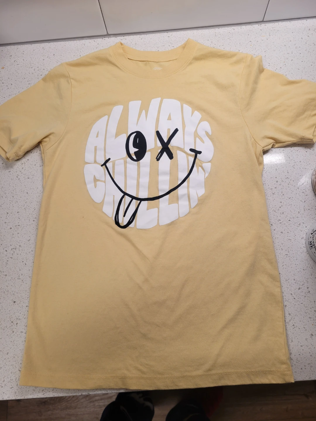 Yellow T-Shirt with "Always Chillin'" Smiley Face Graphic