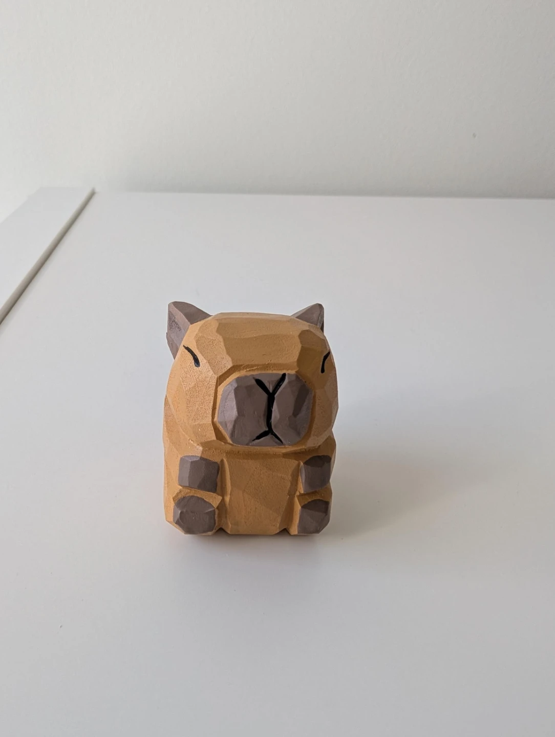 Hand-carved wooden capybara figurine