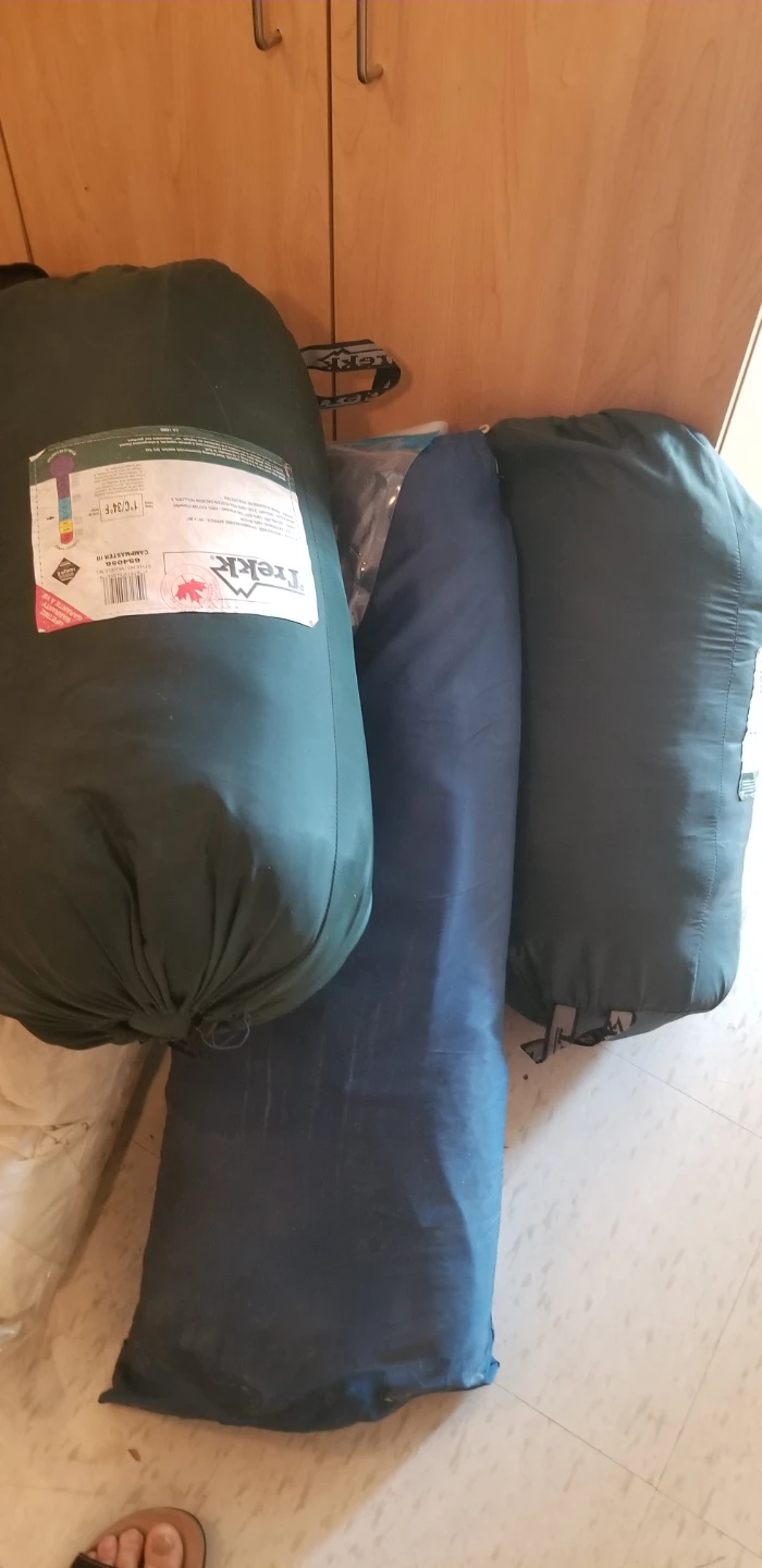 Trekke sleeping bags (2) and sleeping pad