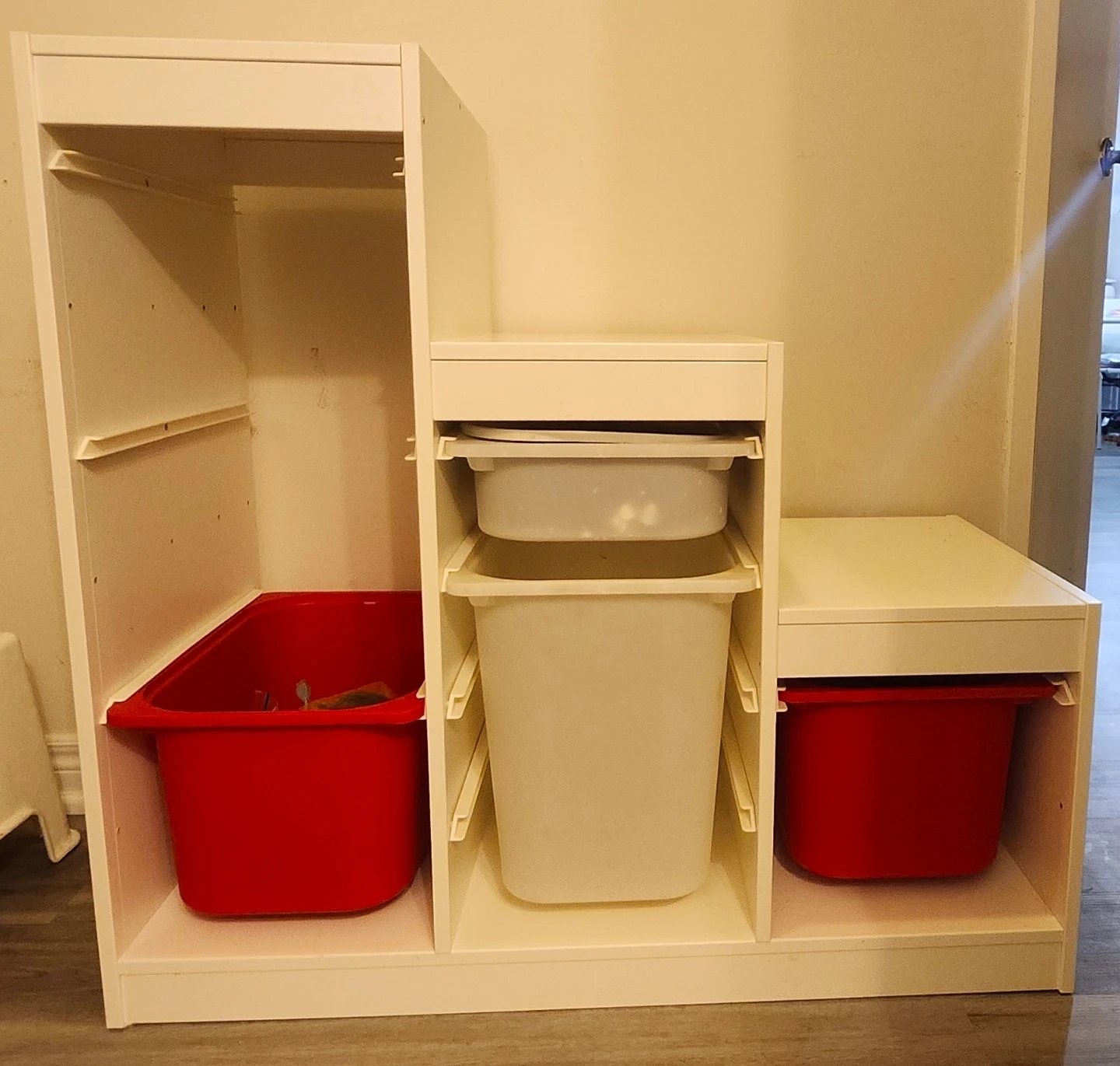 White Storage Unit with Red Bins