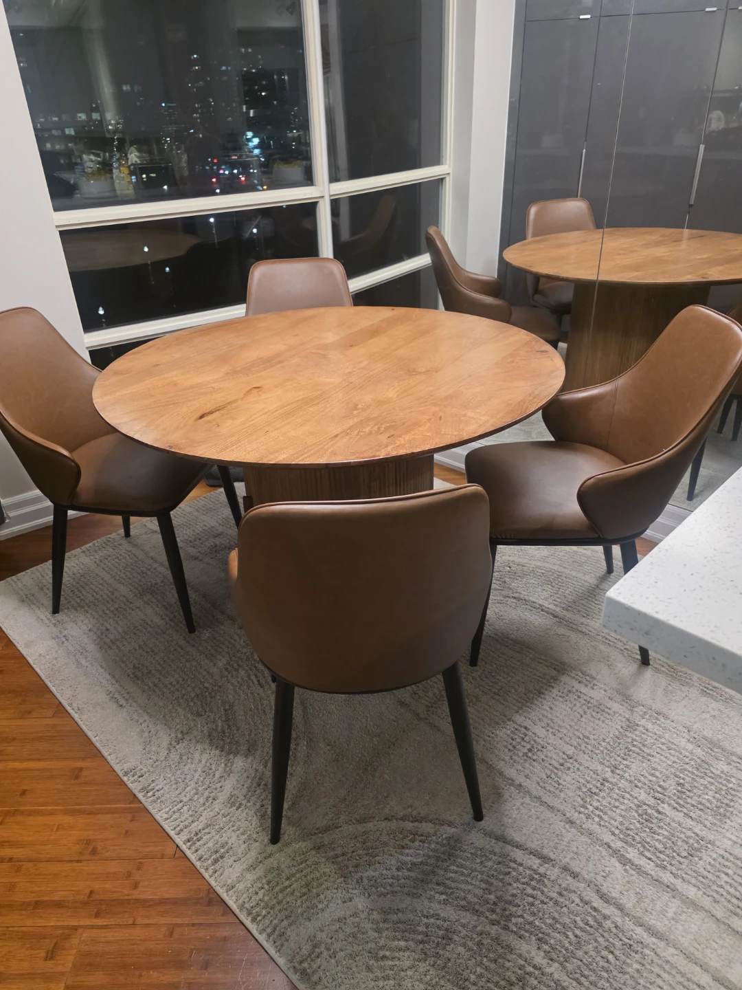 Round Wood Dining Table and 4 Brown Leather Chairs