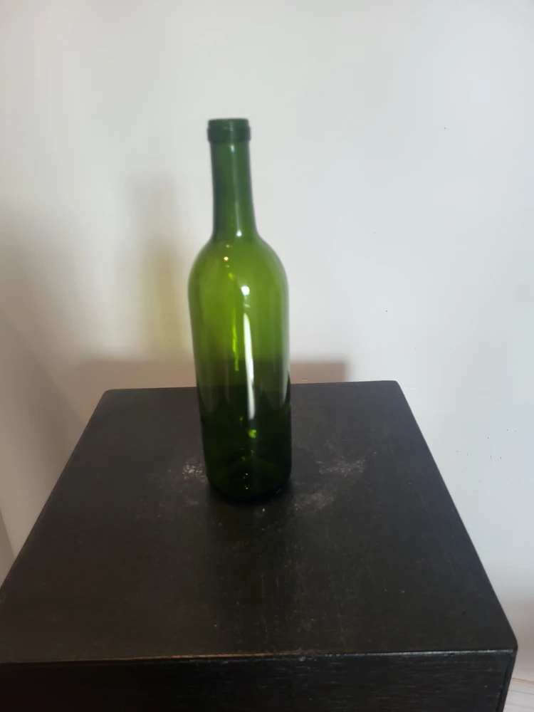 Green glass wine bottle