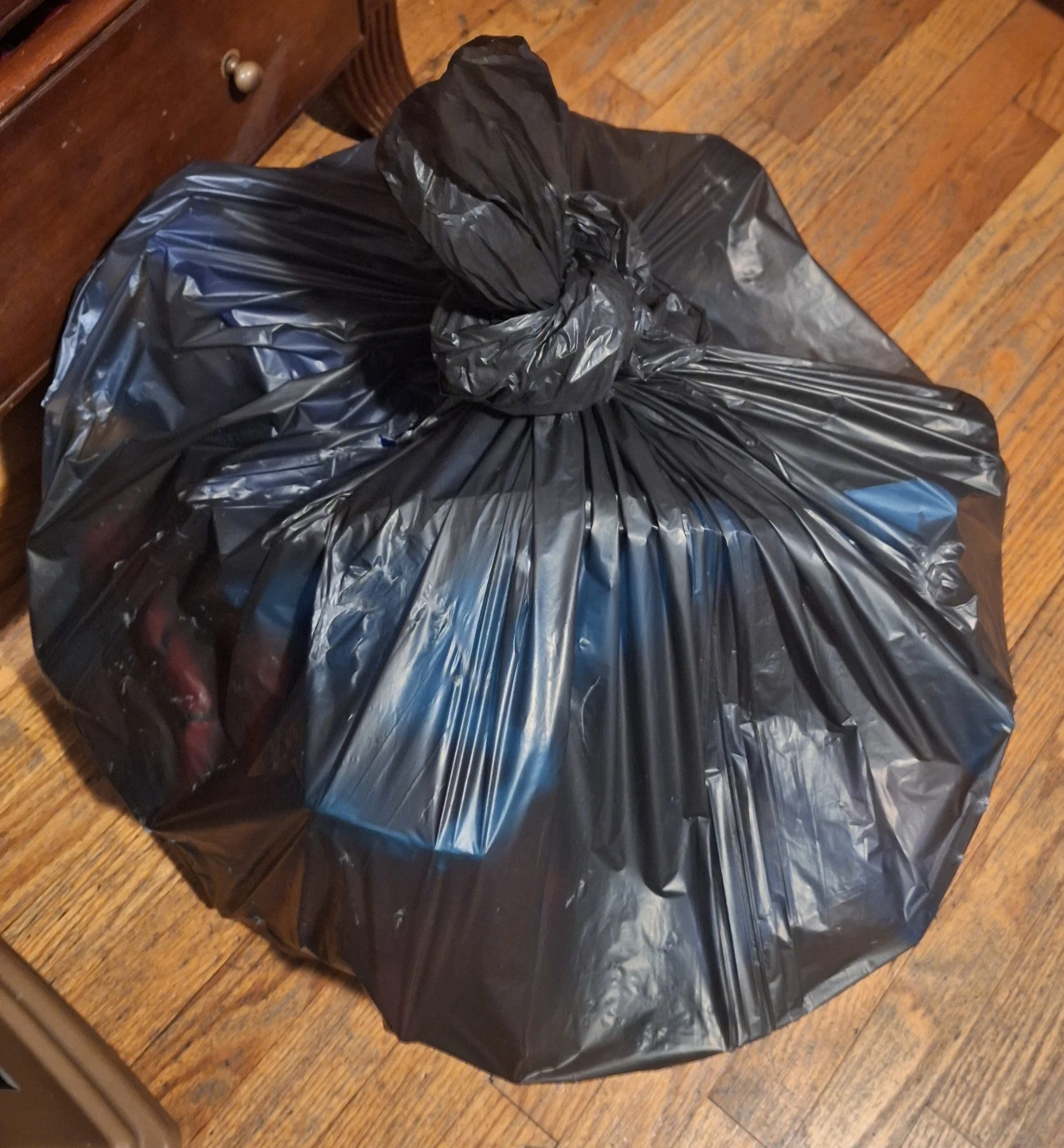 Black Trash Bag Full of boy toys