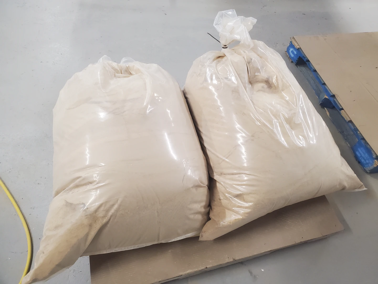 Two large bags of sawdust
