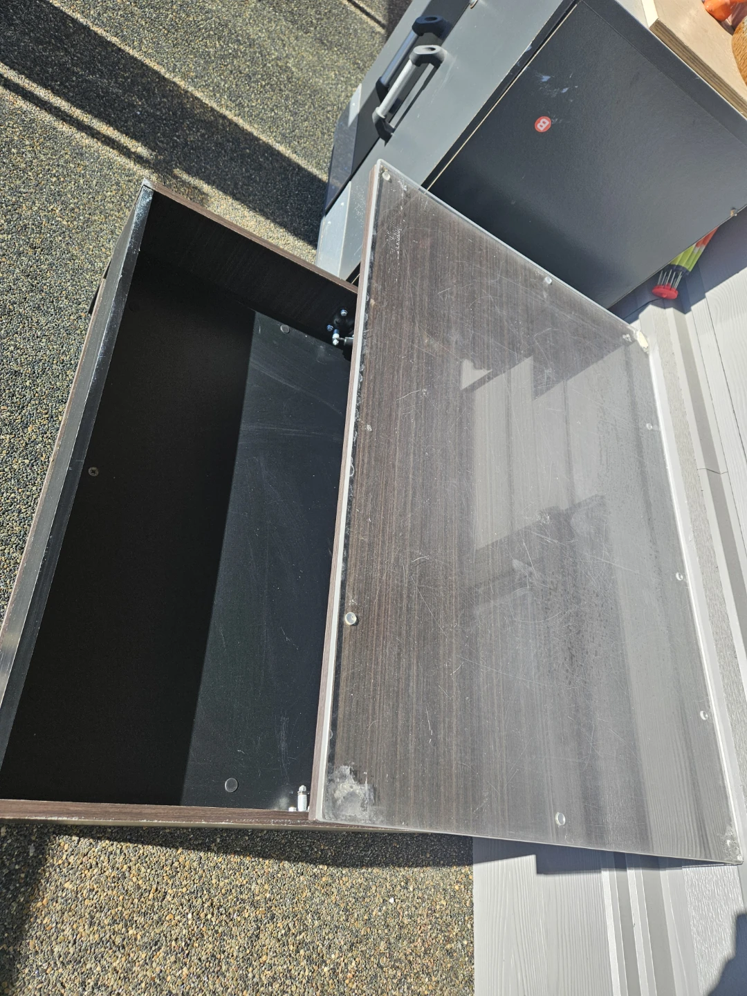 Dark wood coffee table with glass top