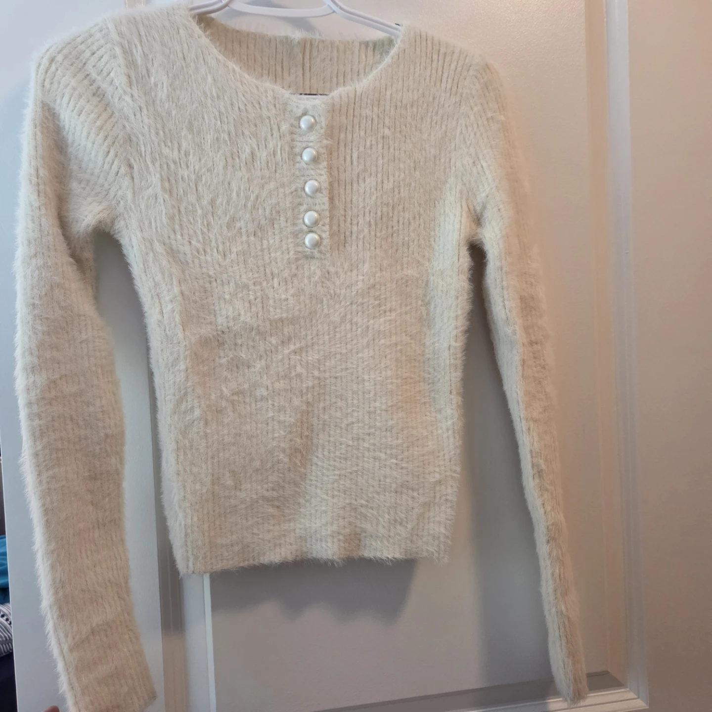 Cream fuzzy button-up sweater
