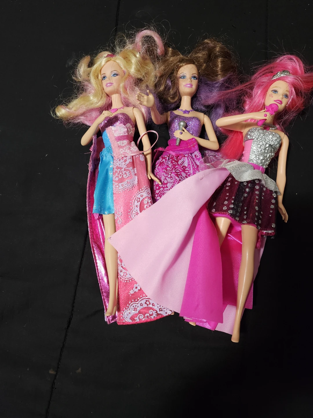 $10 each or $25 for all 3 barbies