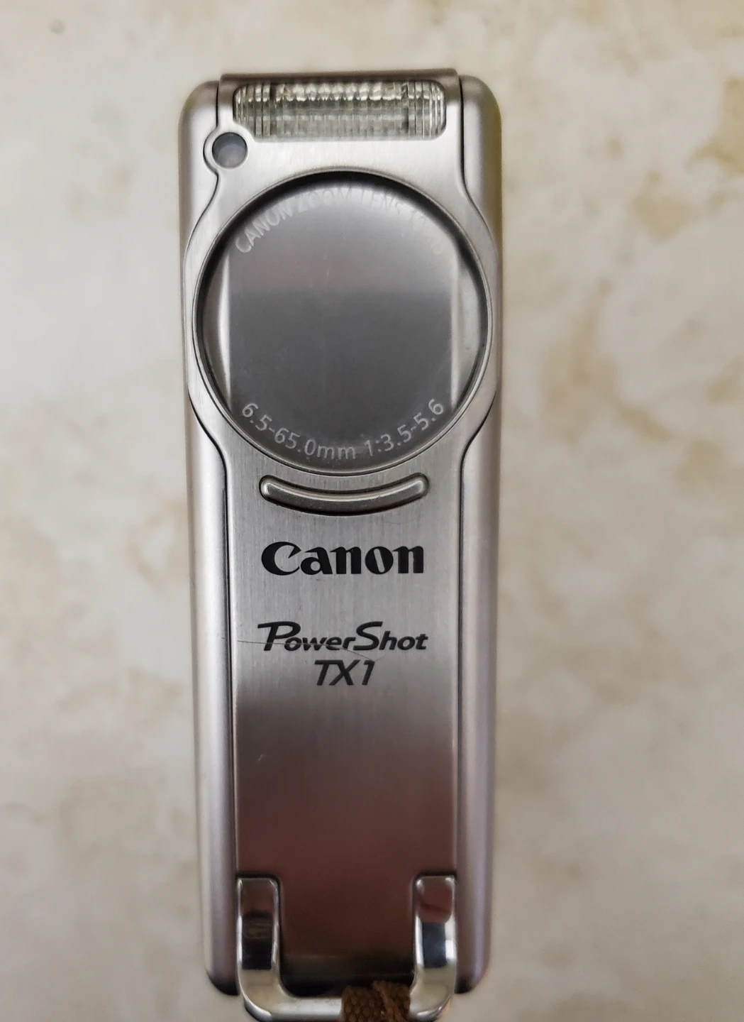 Canon PowerShot TX1 Digital Camera - Silver - photo 2