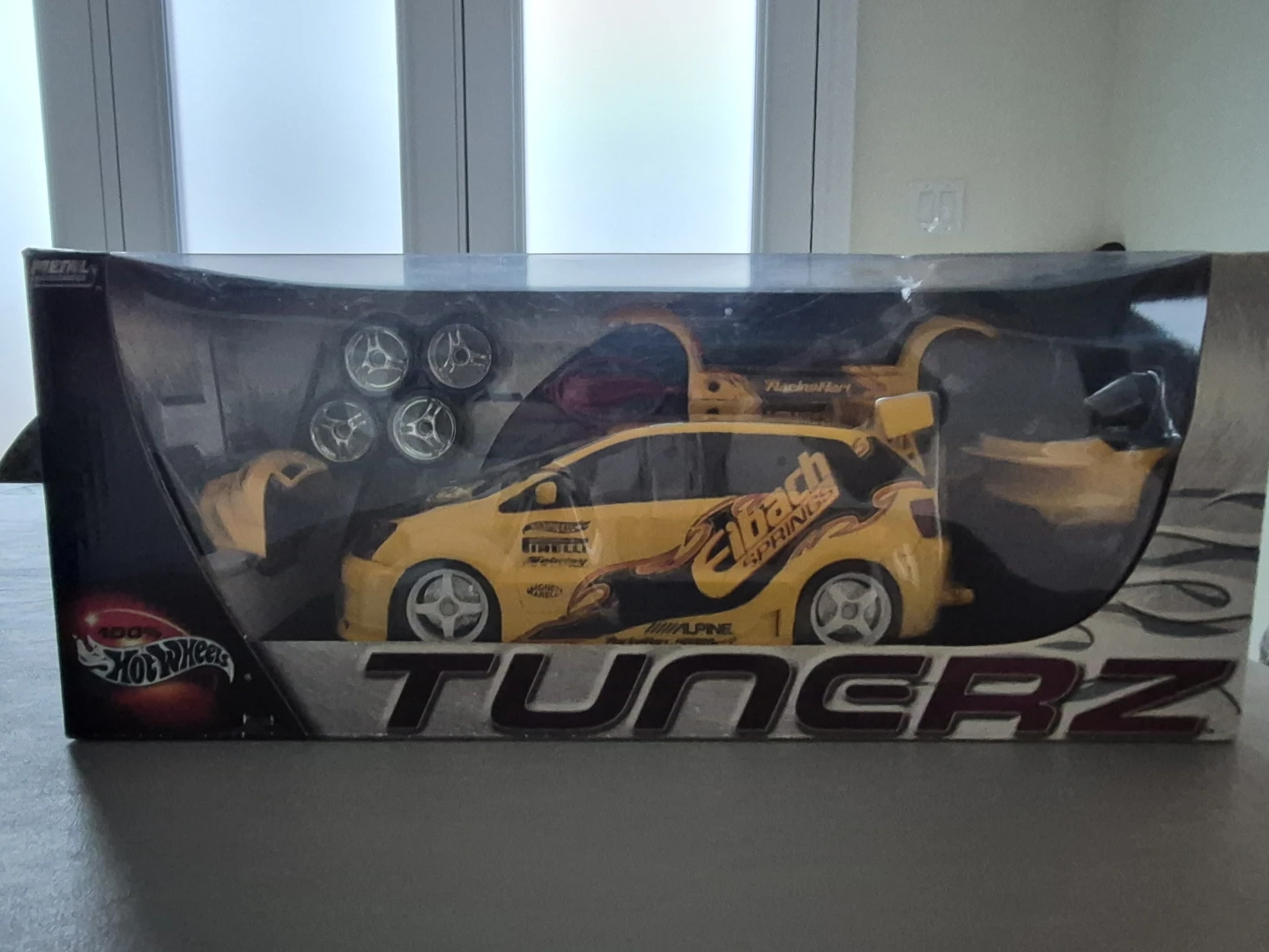 Hot Wheels Tunerz Yellow Car with Extra Wheels