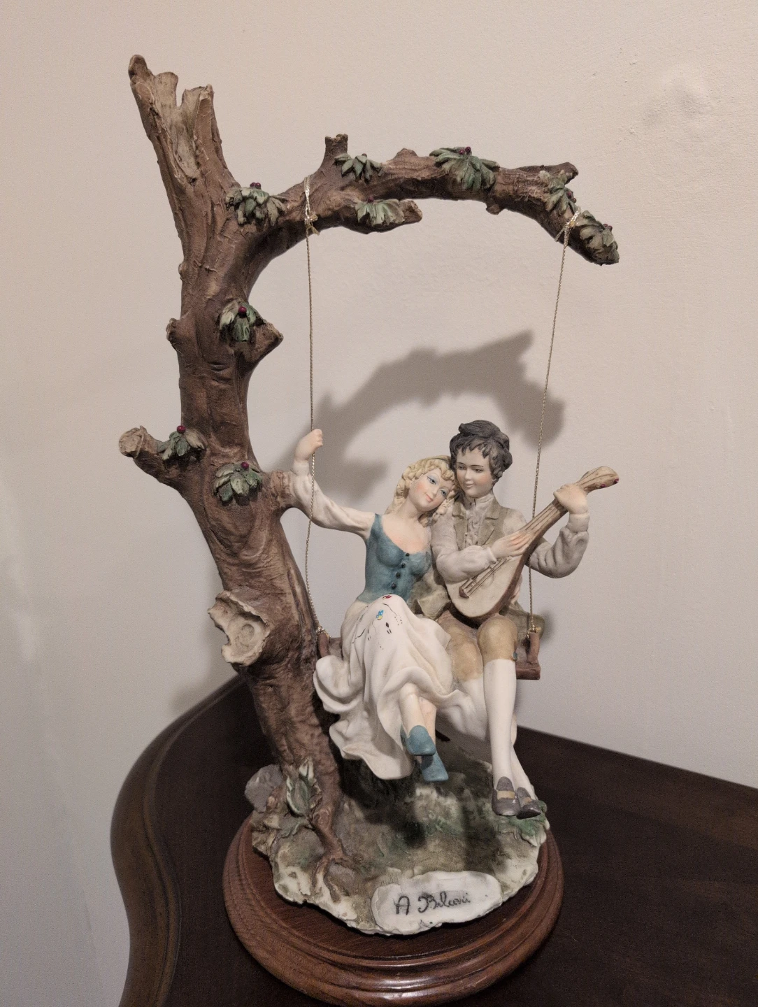 Moving! A. Belcari Figurine of Couple on a Swing